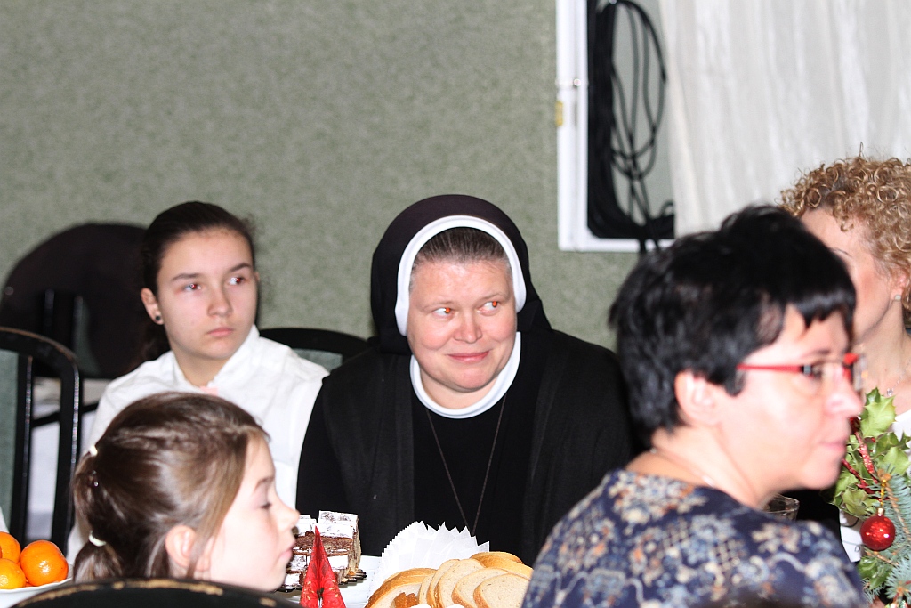 Podopieczni TPD zasiedi do wspólnej wigilii i otrzymali paczki