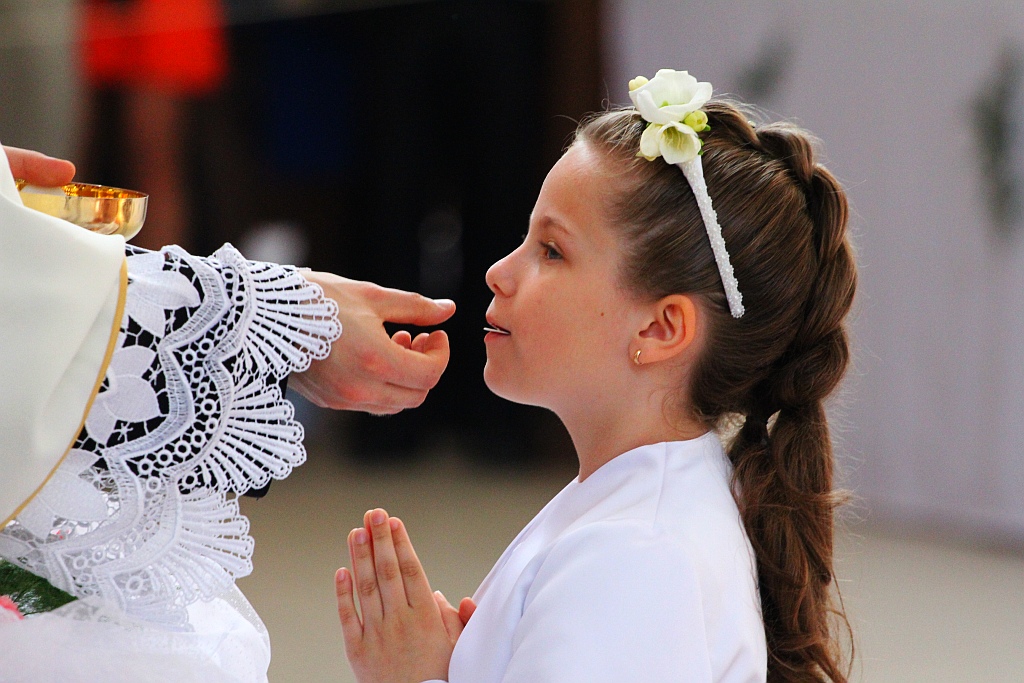 Pierwsza Komunia święta w kościele Matki Bożej Królowej Polski