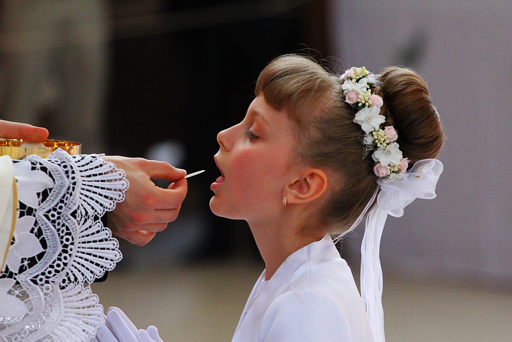 Pierwsza Komunia święta w kościele Matki Bożej Królowej Polski