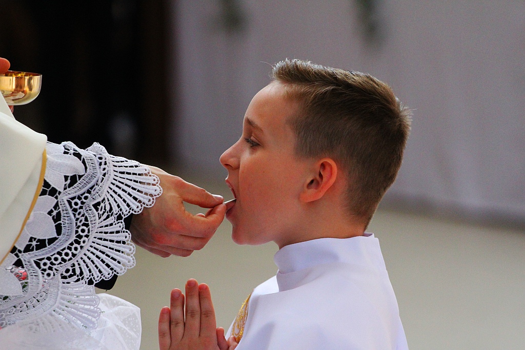 Pierwsza Komunia święta w kościele Matki Bożej Królowej Polski