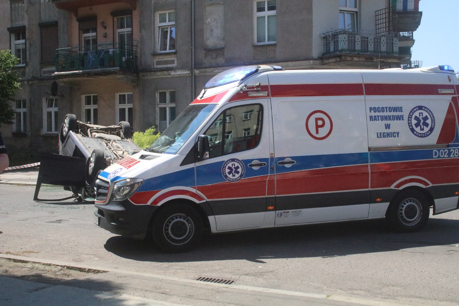 Dachowanie na skrzyżowaniu Żwirki i Wigury i św. Wojciecha